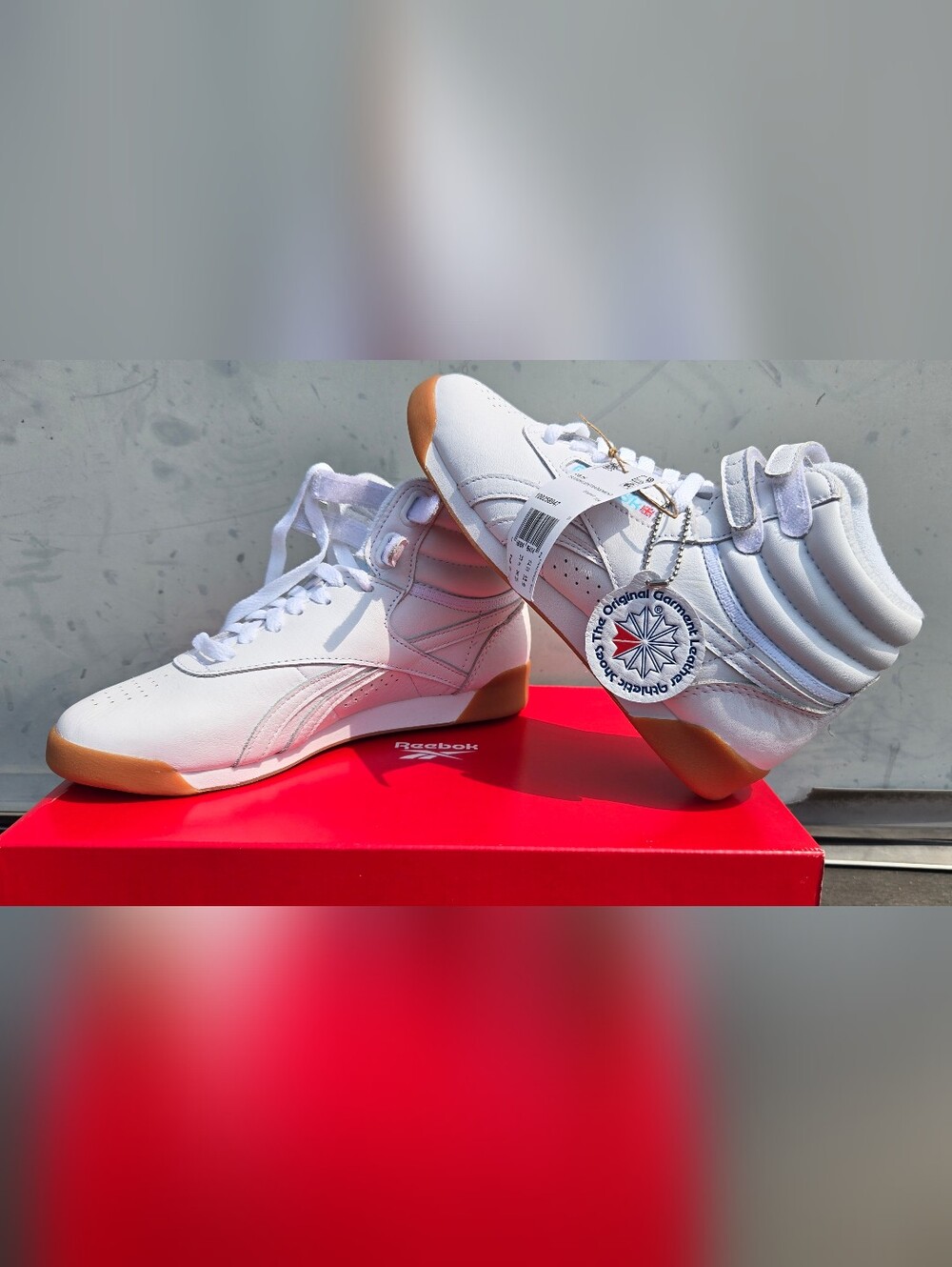 Reebok Women’s White High-Top Sneakers with Gum Soles